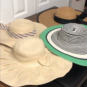 Bundle of wide brimmed straw hats